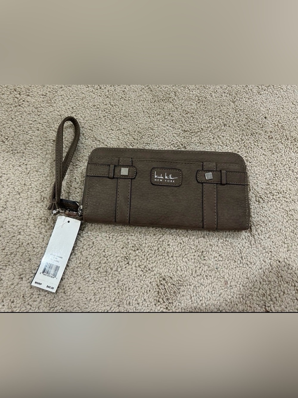Nicole Miller NWT wallet wristlet.
Snakeskin lining